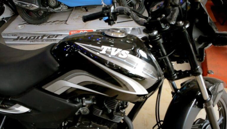 TVS Sport बाइक ₹60,000 में! माइलेज चैंपियन की वजह से सबकी पहली पसंद। जानें इसकी खासियत
